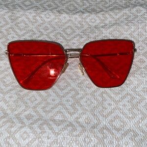 Aldo Gold Frame Sunglasses with Red Tint